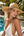 Woven straw fedora hat with beaded trim, adjustable fit, crushable design and UPF 50 sun protection for beach, holiday and summer outdoor wear.