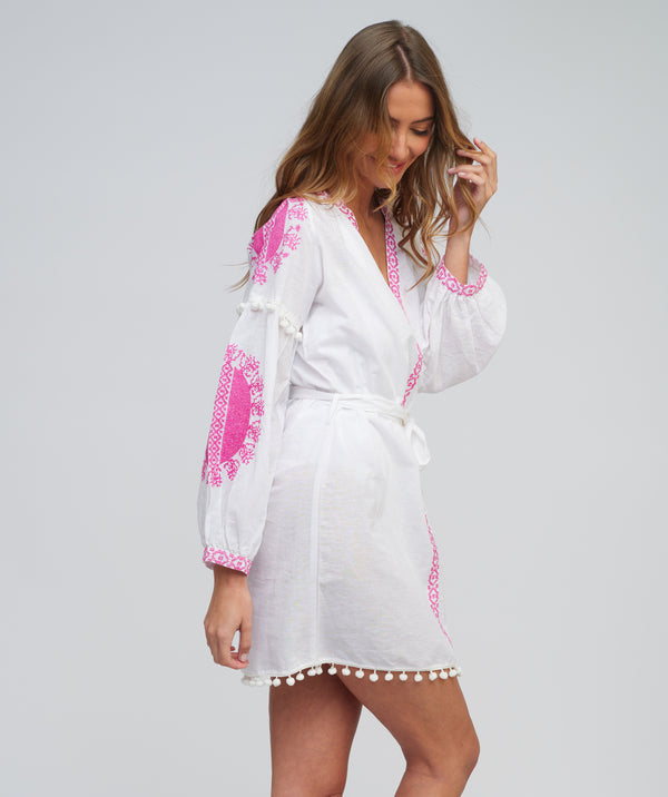 Side View: White/Pink Embroidered Cotton Tunic with Long Sleeves and Tassel Detail