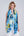 Blue oblong scarf featuring a vibrant abstract floral print for a bold patterned finish. Made from silky, lightweight fabric with a finished hem for a clean, structured look and versatile styling.