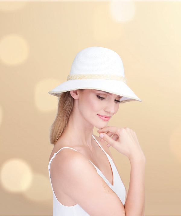 Straw bucket hat with chain belt detail, striped brim edge, adjustable fit and UPF 50 sun protection for beach and summer wear.