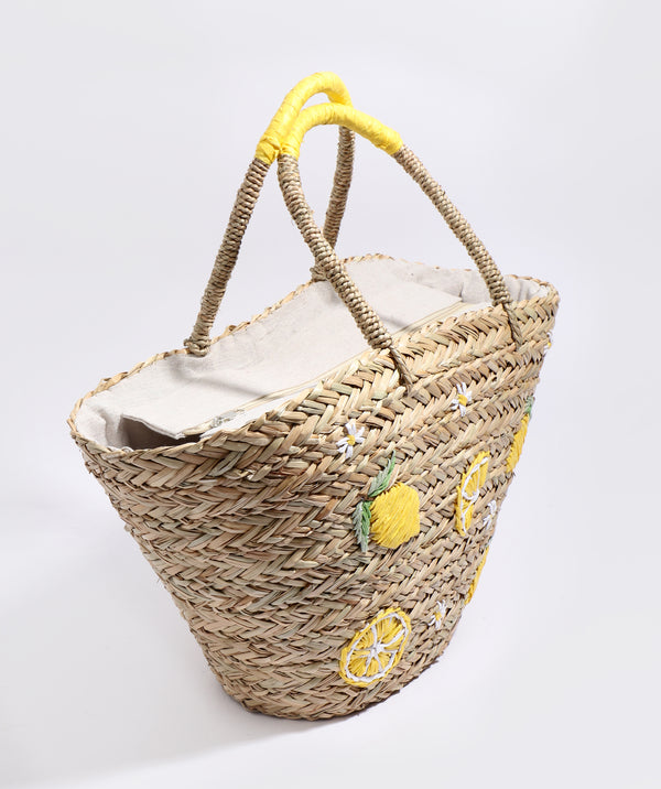 Side View: Sand Straw Basket Bag with Lemon Embroidered Motifs