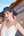 Wide brim straw visor with metallic thread detail, adjustable Velcro closure, elasticated band, lightweight sun protection accessory for beach and summer wear.
