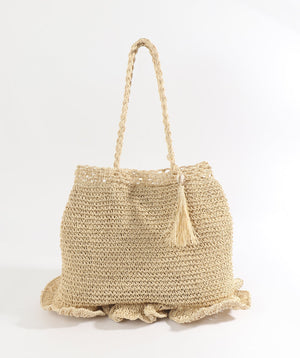 Straw crochet shoulder bag with large handles, snap closure, ruffle detail, shell charm, 3 interior pockets (1 zipped), 45cm width, 60cm height.