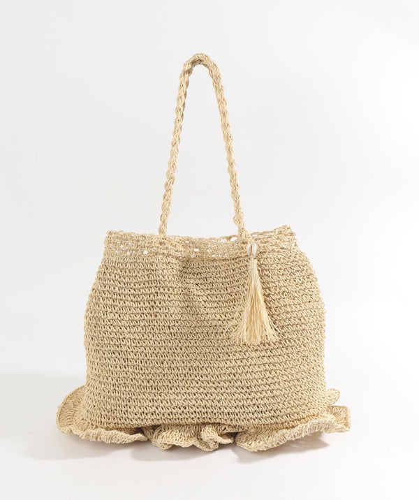 Straw crochet shoulder bag with large handles, snap closure, ruffle detail, shell charm, 3 interior pockets (1 zipped), 45cm width, 60cm height.