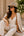 Natural black straw fedora hat with two-tone design, adjustable fit and UPF 50 sun protection for beach, holiday and summer outdoor wear.