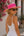 Wide brim straw hat with two-tone design, adjustable fit, crushable construction and UPF 50 sun protection for beach and summer wear.