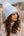 Kiara - Gorro con ribete de piel sintética