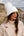 Kiara - Gorro con ribete de piel sintética