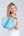 Straw semi-circular half-moon bag, top handles, zip closure, interior pockets, lightweight structured design for summer, beach and travel use.
