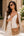 Straw rattan crossbody bag with PU details, gold hardware closure, long adjustable strap, interior storage space, lightweight design for beach and summer travel