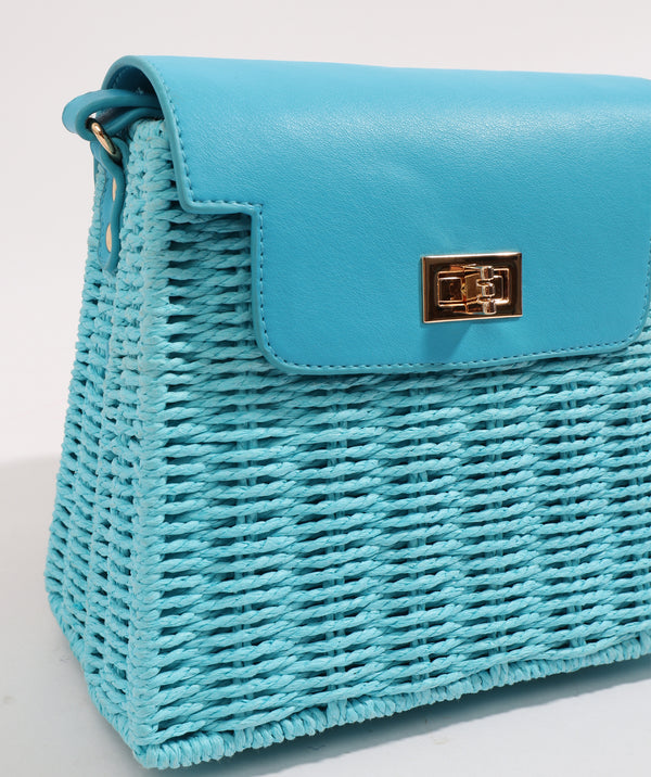 Close Up View: Pale Turquoise Straw Handbag with Tonal PU Details