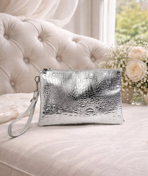 Metallic look clutch bag with zip closure, interior pockets, lightweight structured design for evening wear, parties and special occasions.