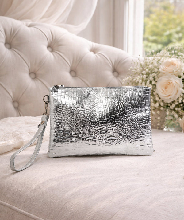 Metallic look clutch bag with zip closure, interior pockets, lightweight structured design for evening wear, parties and special occasions.