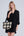 Straw crochet tote bag with floral pattern, top handles, zip closure and interior pockets. Lightweight summer bag for holidays, travel and shopping.