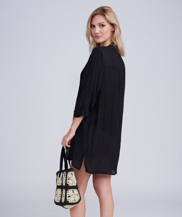 Back View: Black Fringed Beach Shirt with Button Closure and Rolled Cuff Sleeves