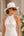 Natural straw fedora hat with floral ribbon trim, adjustable fit and UPF 50+ sun protection for beach, holiday and summer resort wear.