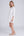 Side View: White Lace-Trimmed Beach Shirt with V-Neck and Buttons