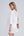 Back View: White Lace-Trimmed Beach Shirt with V-Neck and Buttons