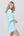 Side View: Aqua Marine Cotton Poncho Style Beach Coverup with Fringes.