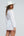 Back View: White Cotton Beach Tunic with Fringe Collar and Lace Panels
